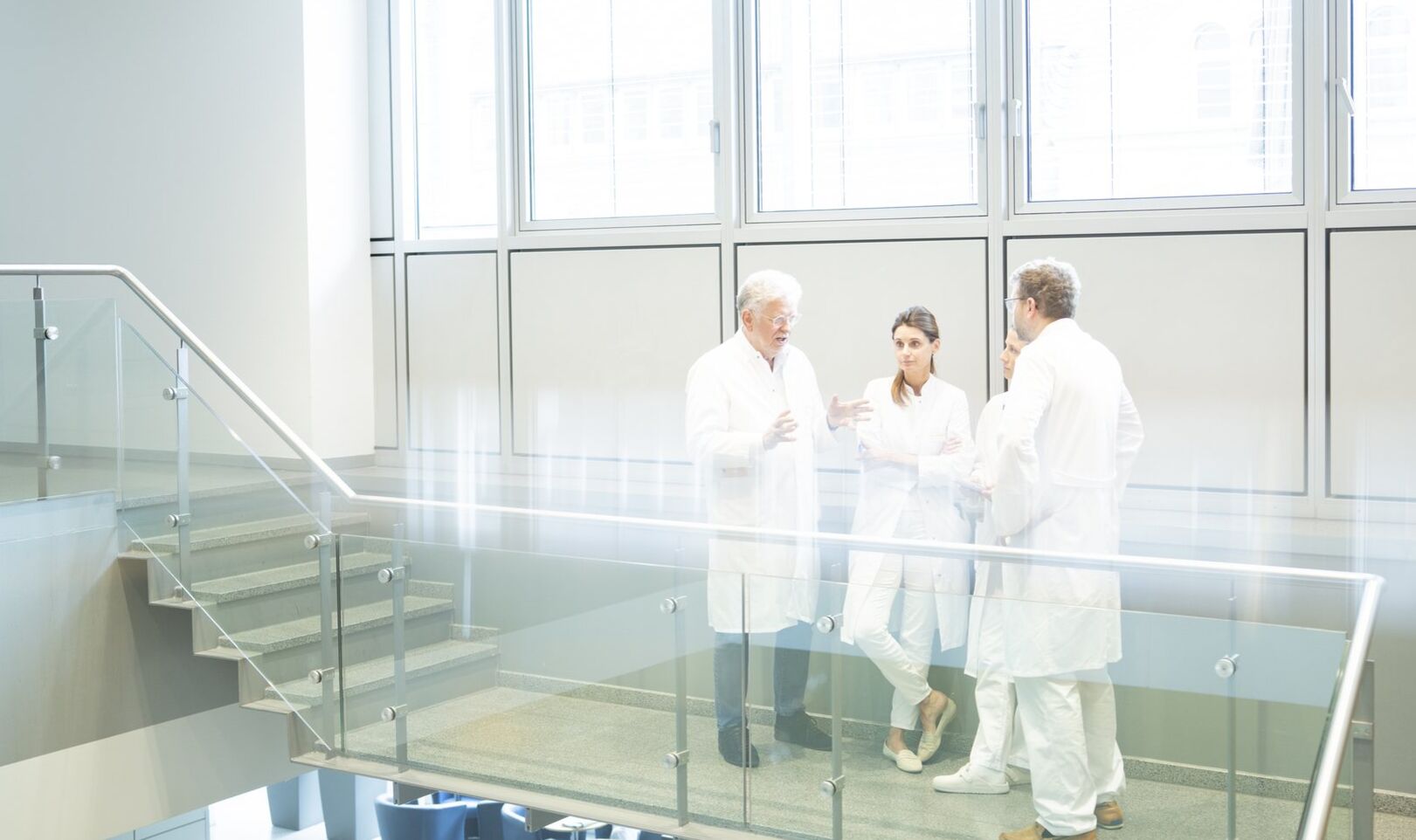 Ärzteteam im Gespräch – PAN Klinik Ärzteteam der PAN Klinik gemeinsam im Gespräch
